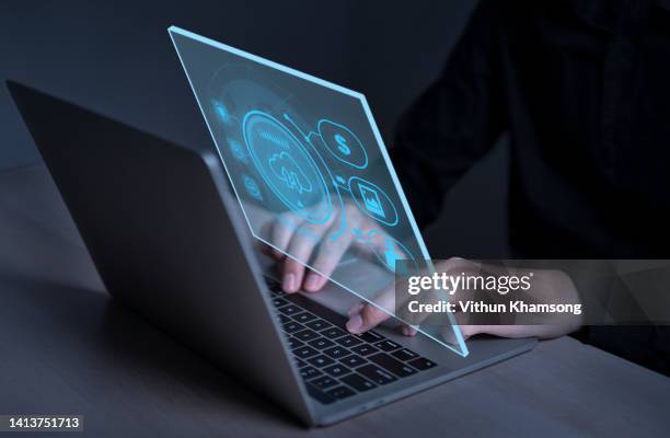 businessman using computer on global network connection for online documentation digital file storage system technology. - computer backup stockfoto's en -beelden