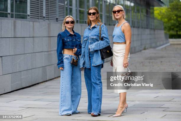 Amelie Stanescu is seen wearing cropped nakd jacket and pants, vintage shoes, Chanel sunglasses, Louis Vuitton bag & Cati Schweyer is seen wearing...