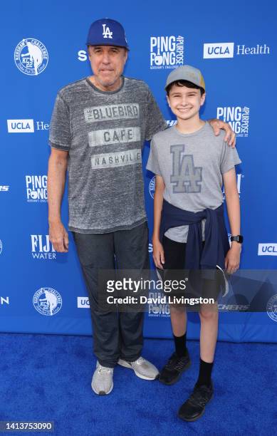 Kevin Nealon and son Gable Ness Nealon attend Clayton Kershaw's 8th Annual Ping Pong 4 Purpose at Dodger Stadium on August 08, 2022 in Los Angeles,...