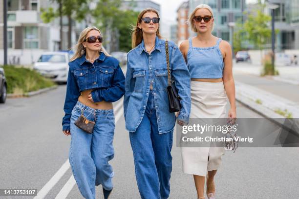 Amelie Stanescu is seen wearing cropped nakd jacket and pants, vintage shoes, Chanel sunglasses, Louis Vuitton bag & Cati Schweyer is seen wearing...