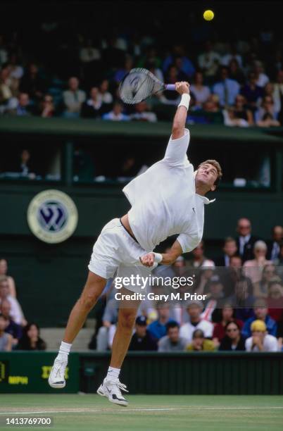 Justin Gimelstob from the United States reaches to serve to Pete Sampras of the United States during their Men's Singles Third Round match at the...