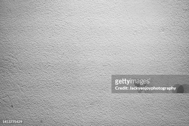 a surface of a raw concrete wall - brave ストックフォトと画像