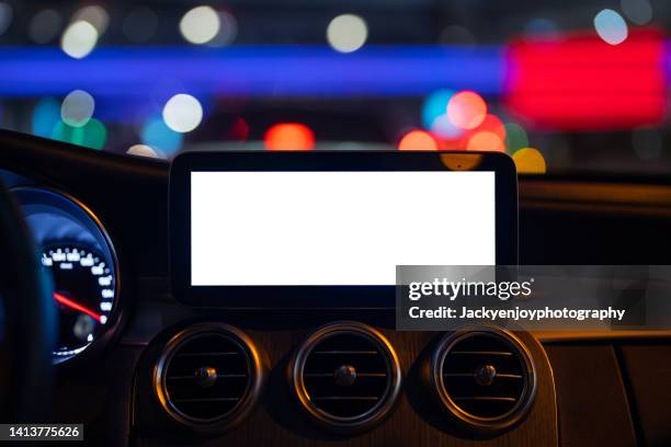 a digital display screen on the dashboard of a modern car - auto display stock-fotos und bilder