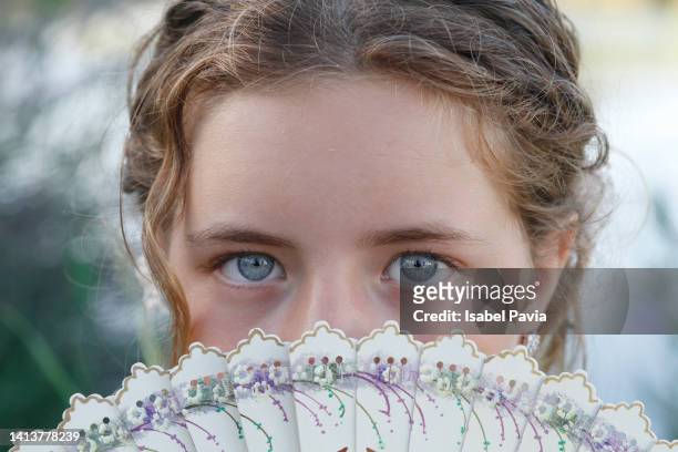 portrait of girl with blue eyes - folding fan stock pictures, royalty-free photos & images
