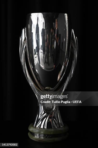 Champions league, Super Cup and UEFA Europa league trophies are displayed at the Fan Village ahead of the UEFA Super Cup Final 2022 on August 09,...