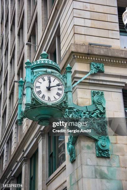 macy’s clock - macys chicago stock pictures, royalty-free photos & images