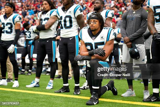 Eric Reid of the Carolina Panthers kneels during the National Anthem before an NFL football game against the Houston Texans Sunday, Sept. 29 in...