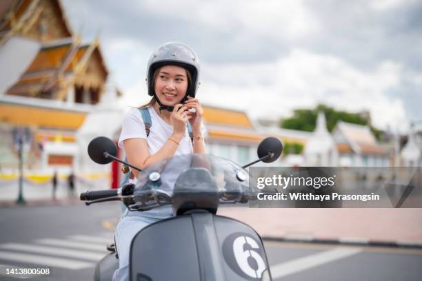 beauty on scooter - motorized vehicle riding stock pictures, royalty-free photos & images