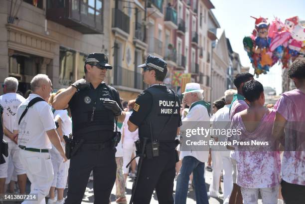 Two police forces during the start of the Fiestas de San Lorenzo 2022 at the Plaza de la Catedral, on August 9 in Huesca, Aragon, Spain. The Fiestas...