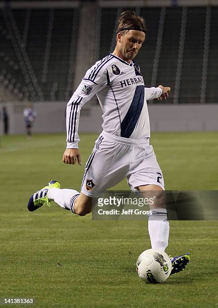 David Beckham of the Los Angeles Galaxy attacks against Toronto FC during a CONCACAF Champions League game at The Home Depot Center on March 14, 2012...