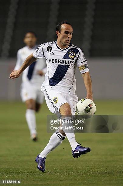 Landon Donovan of the Los Angeles Galaxy attacks against Toronto FC during a CONCACAF Champions League game at The Home Depot Center on March 14,...