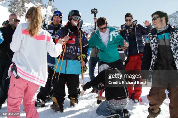 Bronze medalist Andreas Hatveit from Norway and Silver medalist Tom Wallisch are surrounded by fans after the Men Ski Slopestyle Final of the Winter...