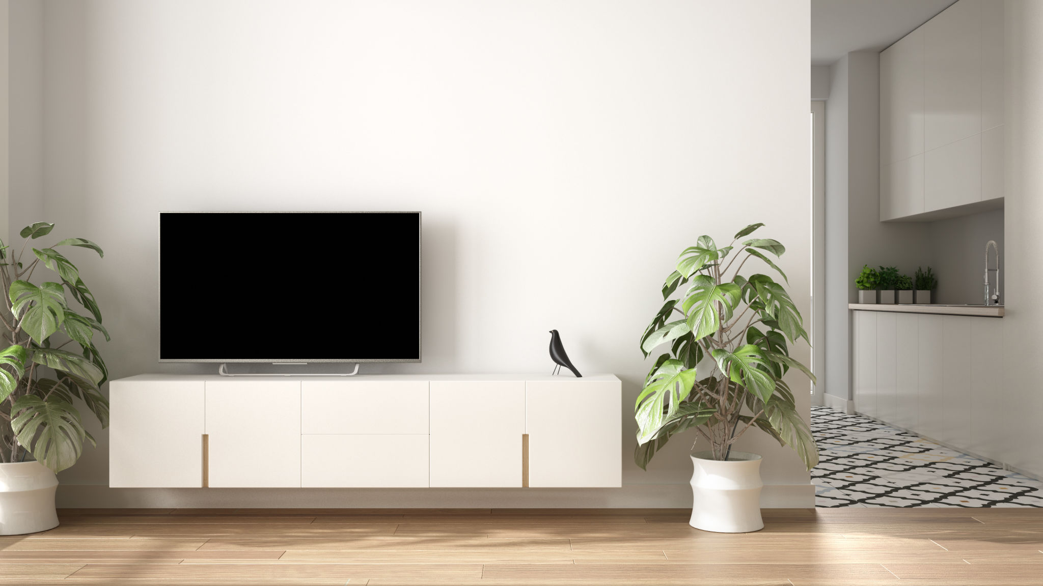 Modern white minimalist living room with small kitchen, parquet floor, tv cabinet, potted plant. Scandinavian colored tiles and decors, architecture interior design concept idea Modern white minimalist living room with small kitchen, parquet floor, tv cabinet, potted plant. Scandinavian colored tiles and decors, architecture interior design concept idea