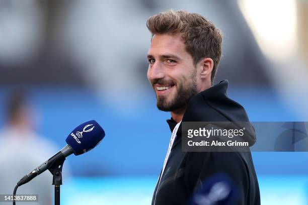 Kevin Trapp of Eintracht Frankfurt speaks to the media during the Eintracht Frankfurt pitch inspection ahead of the UEFA Super Cup Final 2022 at...