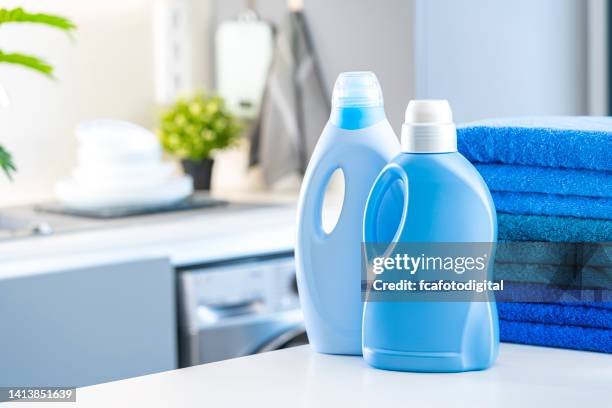 fabric softener and detergent bottles - fabric softener stock pictures, royalty-free photos & images