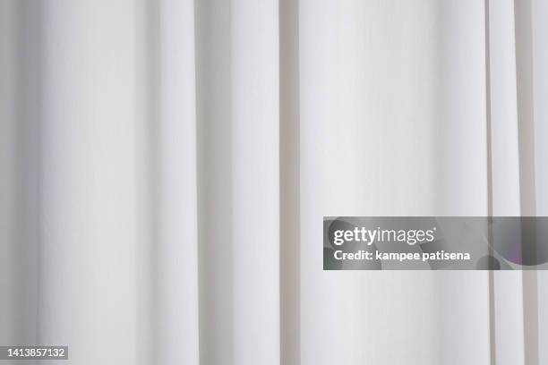 white curtains background - smooth curtain stock-fotos und bilder