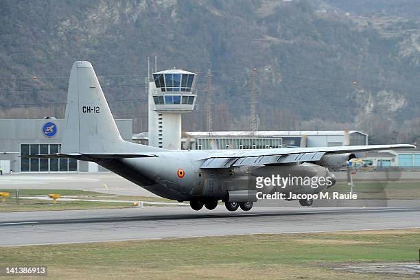Belgian C-130 military transport plane arrives to collect bodies and the injured after the coach disaster on March 15, 2012 at Sion Airport,...