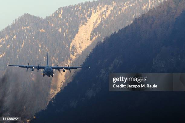 Belgian C-130 military transport plane arrives to collect bodies and the injured after the coach disaster on March 15, 2012 at Sion Airport,...