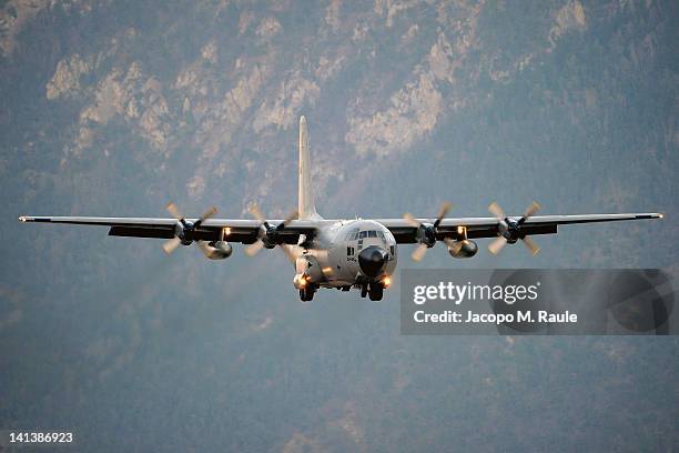 Belgian C-130 military transport plane arrives to collect bodies and the injured after the coach disaster on March 15, 2012 at Sion Airport,...