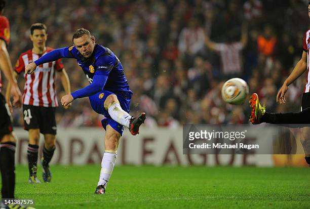 Wayne Rooney of Manchester United scores to make it 2-1 during the UEFA Europa League Round of 16 second leg match between Manchester United and...