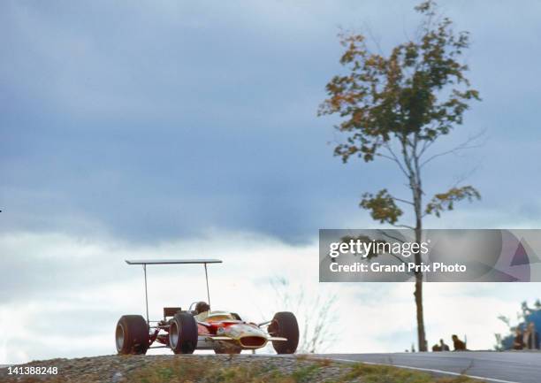 Mario Andretti of the United States drives the Gold Leaf Team Lotus Lotus 49B Ford V8 during practice for the XI United States Grand Prix on 5th...