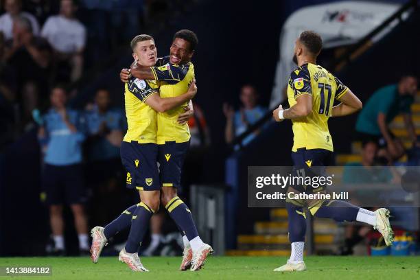 Cameron Brannagan of Oxford United celebrates with team mate Marcus McGuane after scoring their sides second goal during the Carabao Cup First Round...