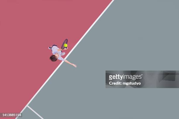 aerial view of boy serving at tennis game - hardcourt 個照片及圖片檔