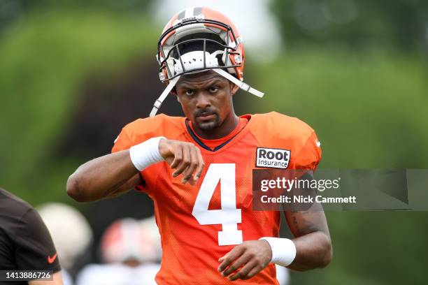 Deshaun Watson of the Cleveland Browns walks off the field during Cleveland Browns training camp at CrossCountry Mortgage Campus on August 09, 2022...