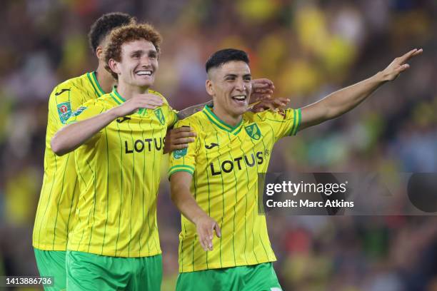 Marcelino Nunez celebrates with Josh Sargent of Norwich City after the penalty shootout during the Carabao Cup First Round match between Norwich City...