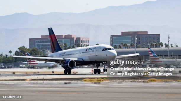 August 08: A Delta flight arrives at John Wayne Airport in Santa Ana, CA on Monday, August 8, 2022.