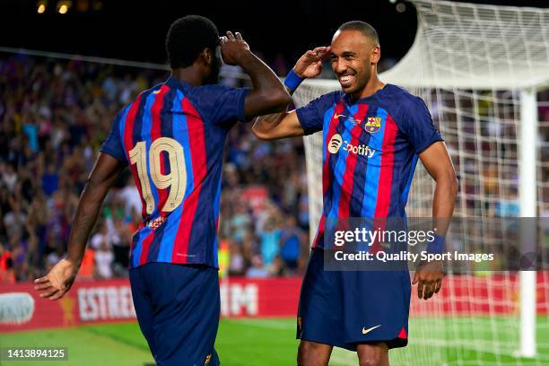 Pierre-Emerick Aubameyang and Franck Kessie of FC Barcelona celebrating a goal during the Joan Gamper Trophy match between FC Barcelona and Pumas...
