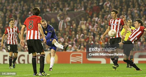 Wayne Rooney of Manchester United scores their first goal during the UEFA Europa League Round of 16 second leg match between Athletic Club of Bilbao...
