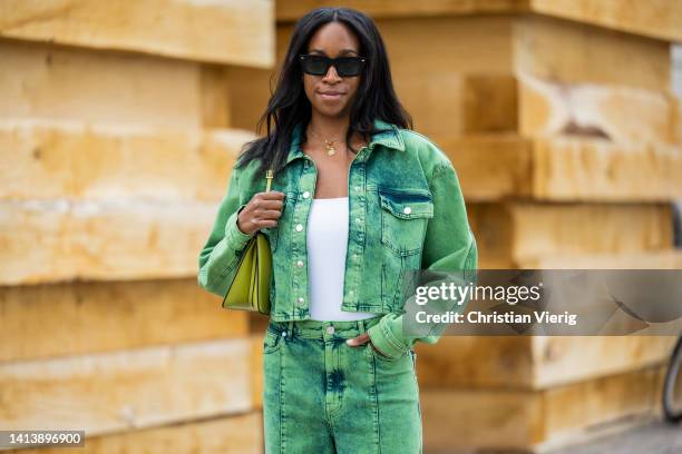 Chrissy Rutherford seen wearing green denim jacket, jeans outside Lovechild 1979 during Copenhagen Fashion Week Spring/Summer 2023 on August 09, 2022...