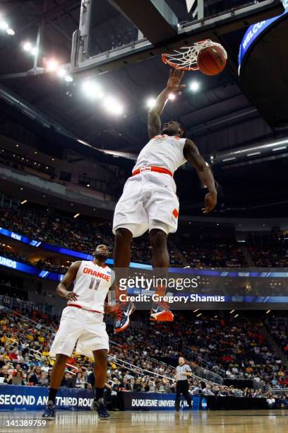 Dion Waiters of the Syracuse Orange dunks the ball against the UNC Asheville Bulldogs during the second round of the 2012 NCAA Men's Basketball...