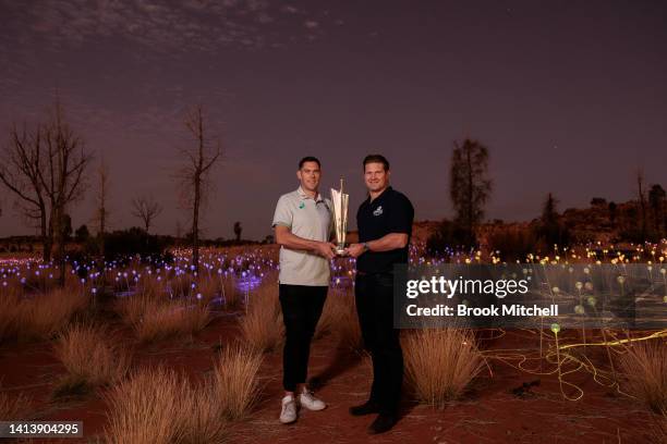 Scott Boland and Shane Watson pose with the ICC Men's T20 World Cup Trophy Tour at Uluru on August 08, 2022 in Uluru, Australia. The T20 World Cup...