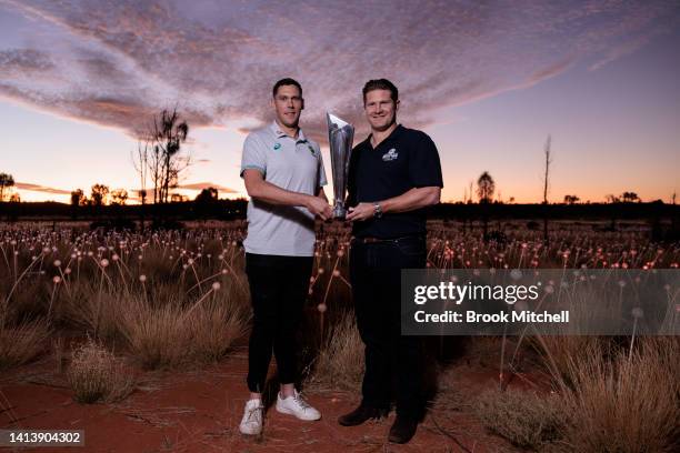 Scott Boland and Shane Watson pose with the ICC Men's T20 World Cup Trophy Tour at Uluru on August 08, 2022 in Uluru, Australia. The T20 World Cup...