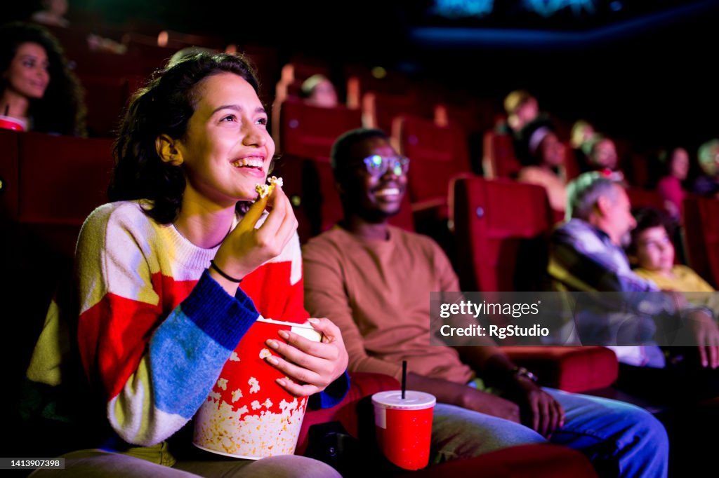 Friends having fun at the cinema