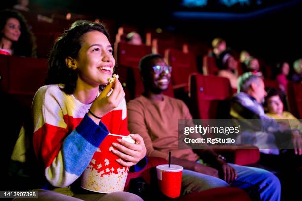 friends having fun at the cinema - film industry stock pictures, royalty-free photos & images