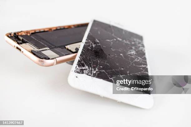 mobile phone cracked and broken - repairing iphone stock pictures, royalty-free photos & images