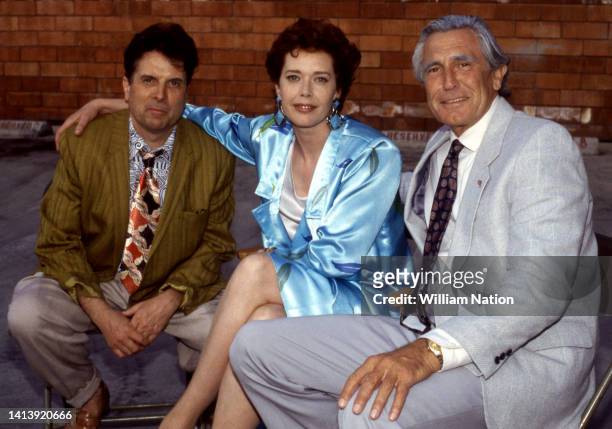 Movie director Francis Leroi , Dutch actress and model Sylvia Kristel and Australian actor and former model George Lazenby, pose for a portrait on...