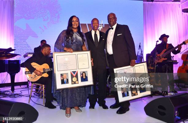 Gary Houston and Pat Houston accept a plaque from Georgia State Rep. Billy Mitchell during Inaugural Whitney E. Houston Legacy Foundation Black Tie...