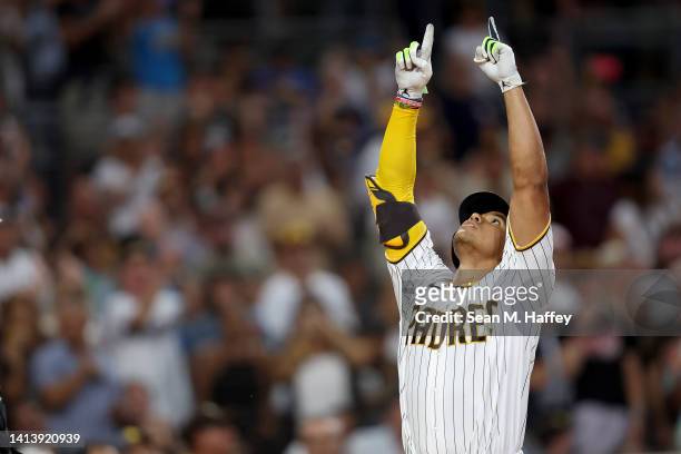 Juan Soto of the San Diego Padres reacts after hitting a solo homerun during the fourth inning of a game against the San Francisco Giants at PETCO...