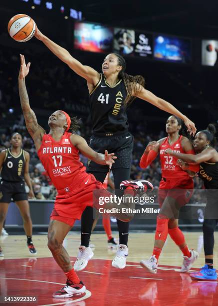 Kiah Stokes of the Las Vegas Aces blocks a shot by Erica Wheeler of the Atlanta Dream during their game at Michelob ULTRA Arena on August 09, 2022 in...