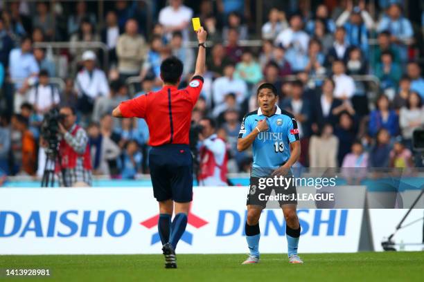 Yoshito Okubo of Kawasaki Frontale reacts as he is shown a yellow card during the J.League Meiji Yasuda J1 second stage match between Kawasaki...