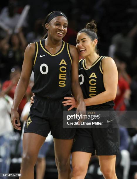 Jackie Young and Kelsey Plum of the Las Vegas Aces react on the court after the Aces made a defensive stop with less than 10 seconds left in the...