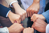 Diverse multiethnic Partners hands together teamwork group of multi racial people meeting join hands togetherness. Diversity people hands join empower partnership teams connection volunteer community