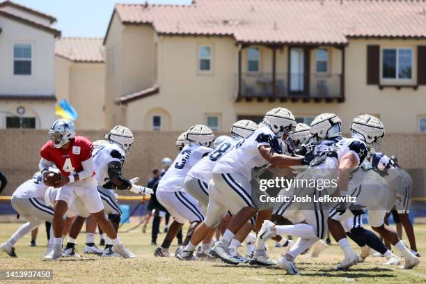 The Dallas Cowboys runs through a play during training camp at River Ridge Fields on August 09, 2022 in Oxnard, California.