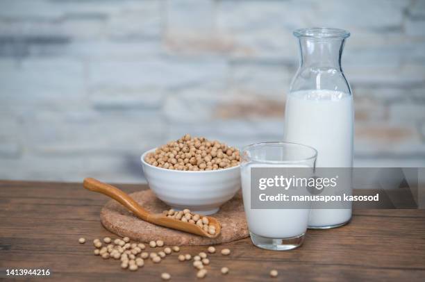 soy milk on the table. - legume table stockfoto's en -beelden