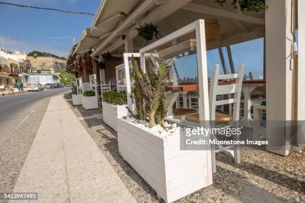 restaurant at rethymnon town on crete, greece - flower pot island stock pictures, royalty-free photos & images