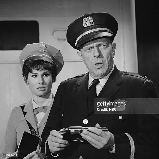 The Week They Stole Payday" Episode 11 -- Aired 4/3/67 -- Pictured: Ann Prentiss as Sgt. Candy Kane, Bill Zuckert as Police Chief Segal -- Photo by:...